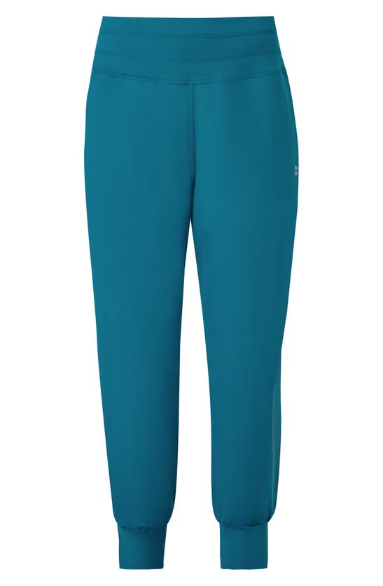 Shop Sweaty Betty Gaia Pocket Joggers In Reef Teal Blue