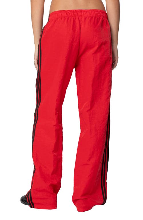 Shop Edikted Felicity Low Rise Nylon Track Pants In Red