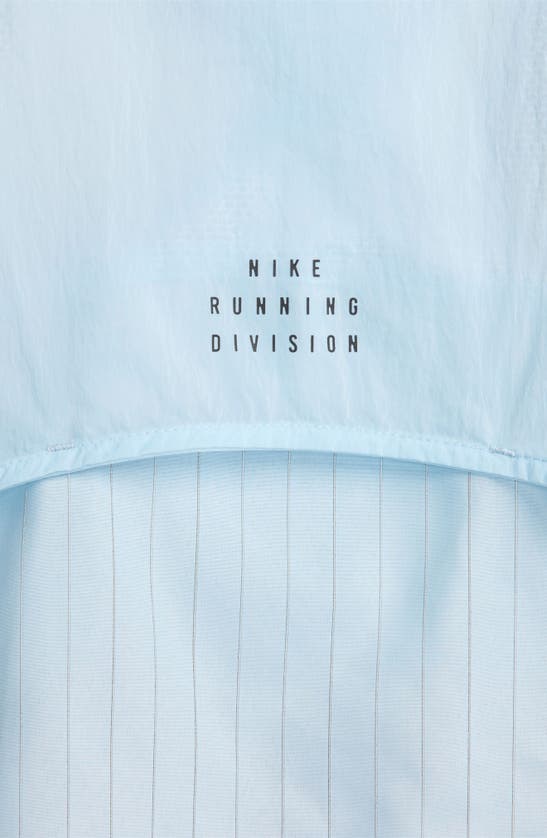 Shop Nike Running Division Reflective Water Repellent Jacket In Light Armory Blue/ Ashen Slate