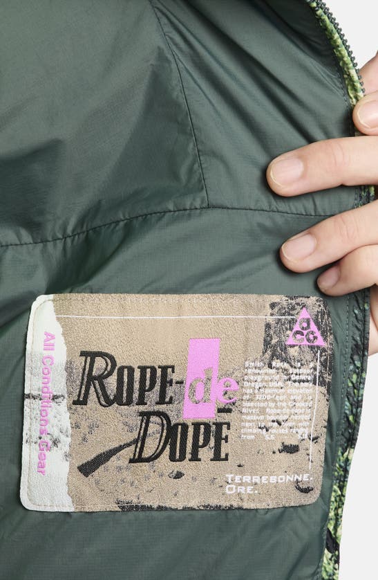 Shop Nike Acg Rope De Dope Therma-fit Adv Allover Print Jacket In Vintage Green/ Summit White