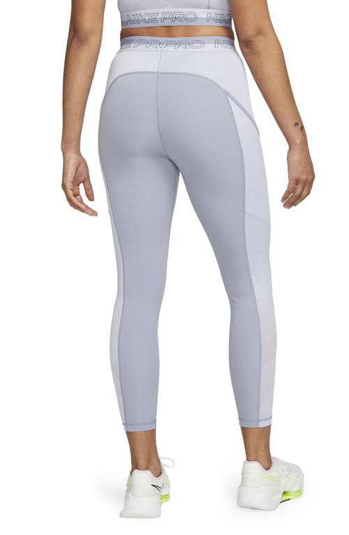 Shop Nike Pro High Rise 7/8 Leggings In Indigo Haze/oxygen Purple