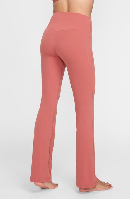 Shop Nike Dri-fit Flare Leggings In Canyon Pink/black