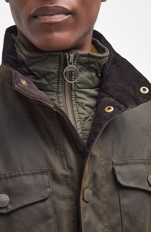 Shop Barbour Ogston Water Resistant Waxed Cotton Jacket With Removable Quilted Bib In Olive