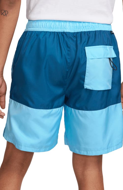 Shop Nike Essentials Colorblock Flow Shorts In Blue Chill/dark Blue/white