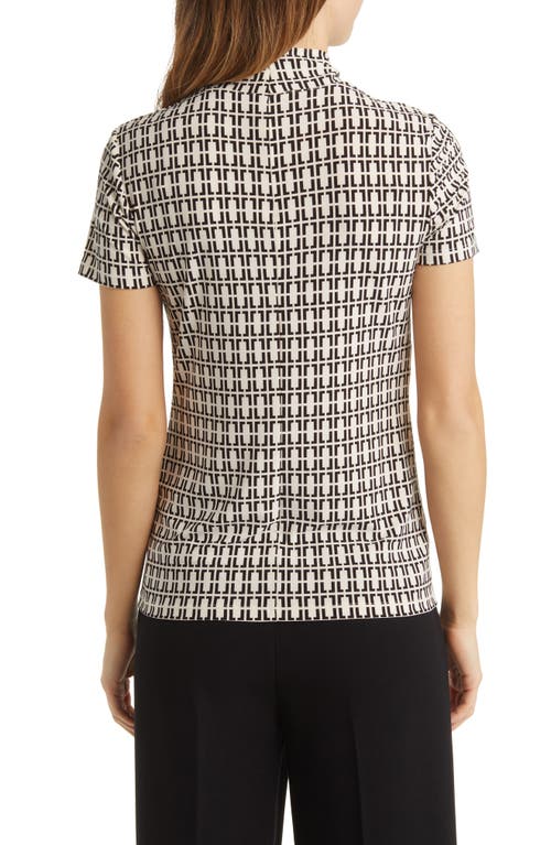Shop Anne Klein Geo Print Short Sleeve Mock Neck Top In Anne White/anne Black