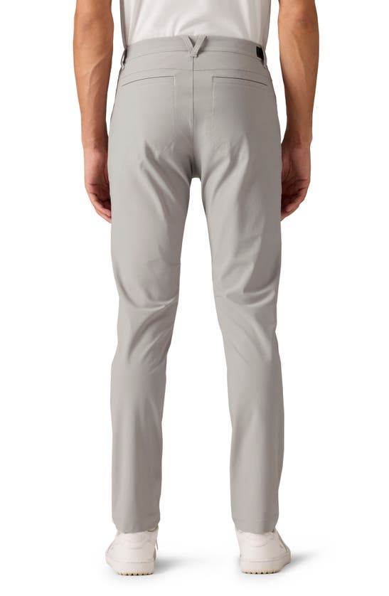 Shop Rhone Momentum Water Repellent Flat Front Golf Pants In Fossil Gray