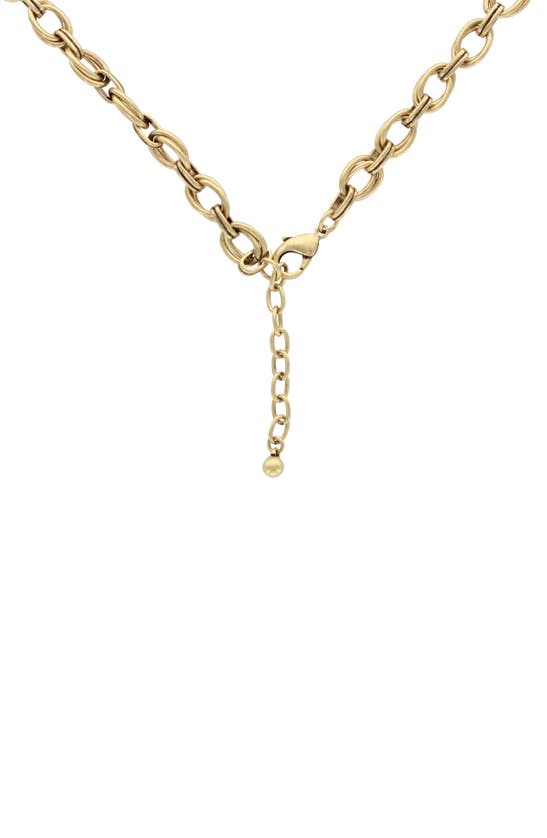 Shop Olivia Welles Corissa Cluster Bib Necklace In Burnished Gold / Topaz