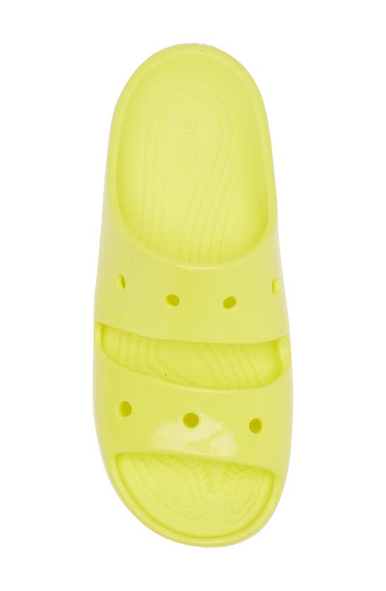 Shop Crocs Classic Neon Slide Sandal In Acidity