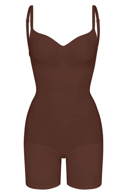 Shop Skims Seamless Sculpt Low Back Mid Thigh Bodysuit In Cocoa