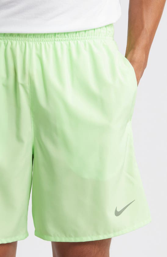 Shop Nike Dri-fit Challenger Athletic Shorts In Vapor Green/ Vapor Green