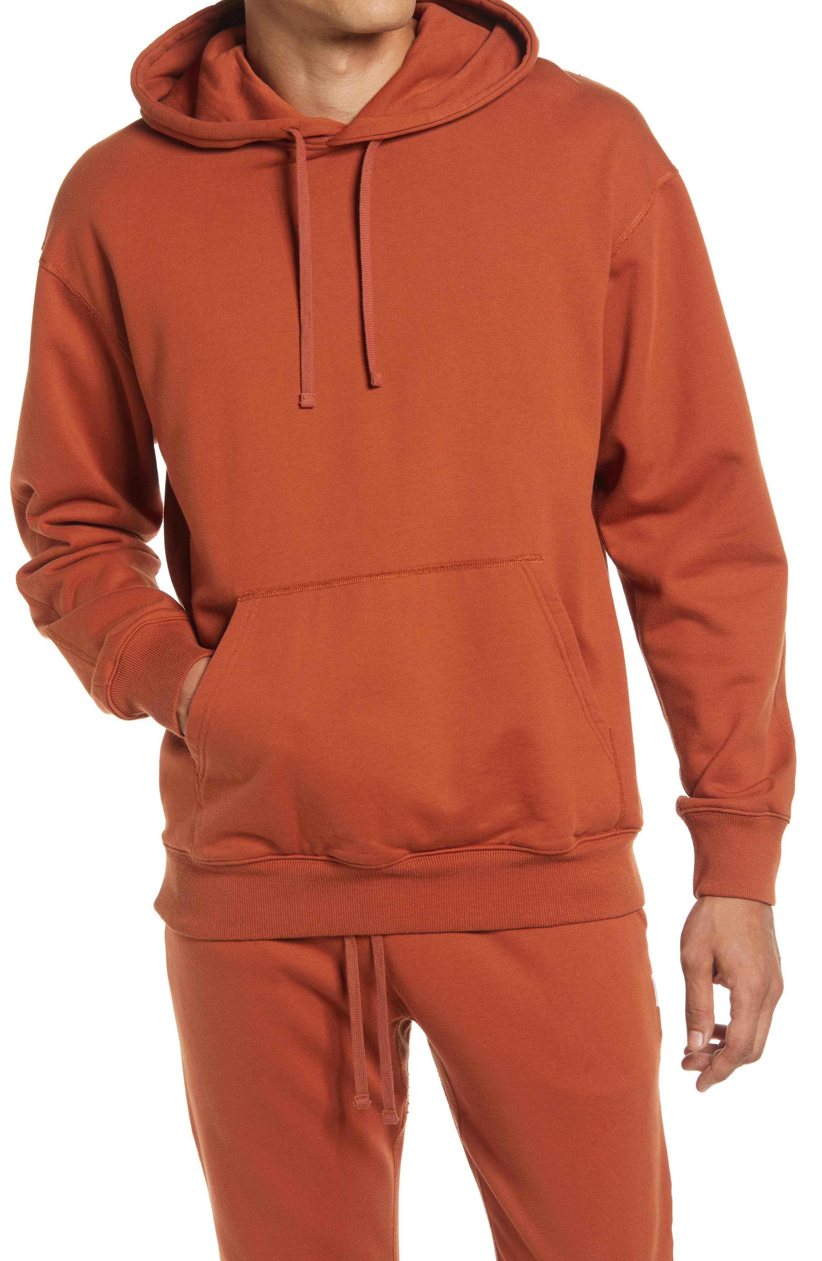 orange sweatpants and sweatshirts