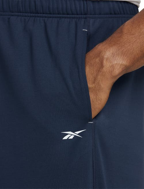 Shop Reebok Performance Jersey Elastic-hem Tech Pants In Navy