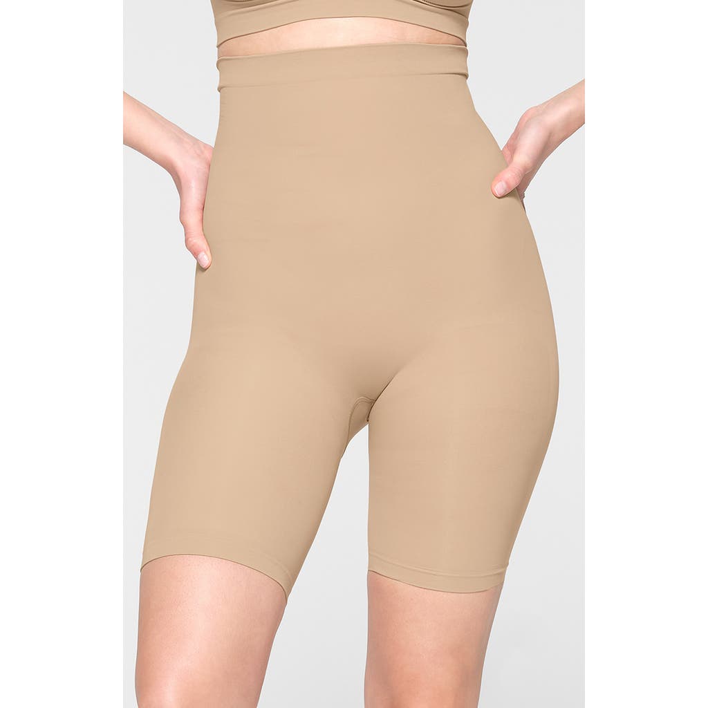 Skims Sculpting Above The Knee Shorts In Clay