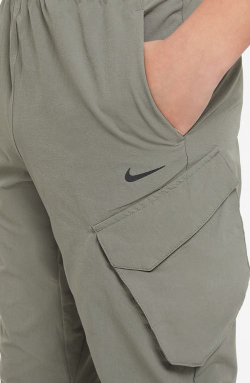 Shop Nike Kids' City Utility Stretch Nylon Cargo Pants In Dark Stucco/black