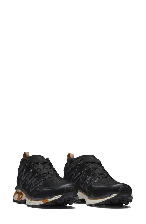 Salomon Gender Inclusive XT-Rush Sneaker in Black/Ebony/Marmalade