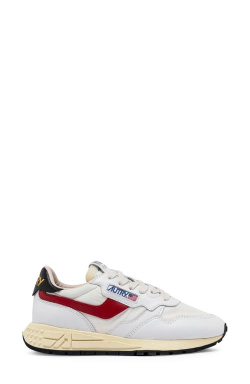 Shop Autry Reelwind Low Water Resistant Sneaker In White/red