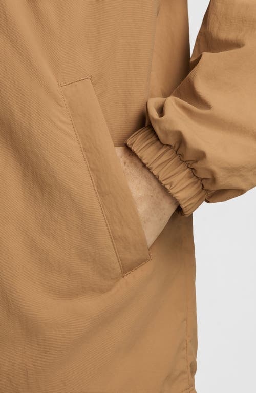 Shop Nike Sportswear Essential Water Repellent Oversize Jacket In Flax/black