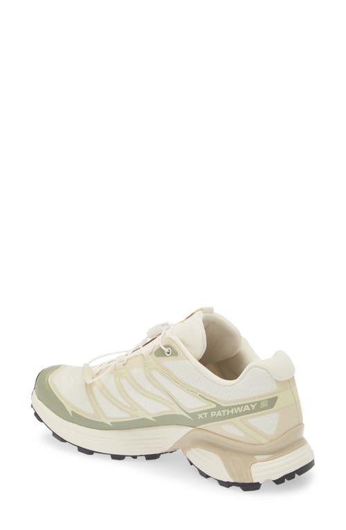 Shop Salomon Gender Inclusive Xt-pathway 2 Sneaker In White/vanilla Ice