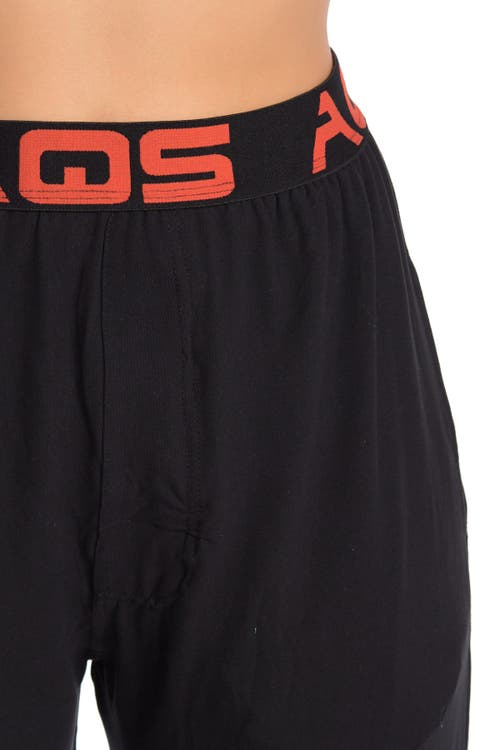 Shop Aqs Soft Knit Lounge Pants In Black W/orange
