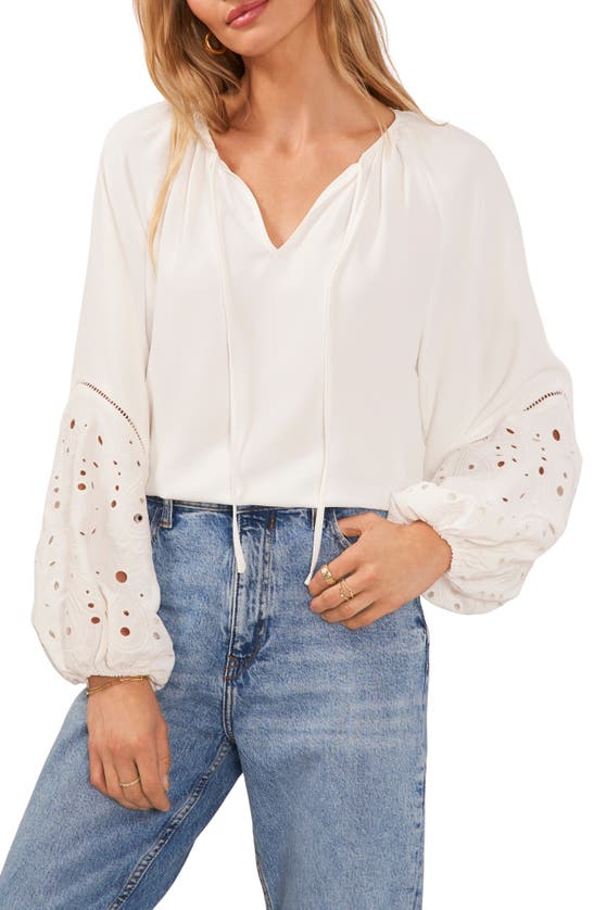 Vince Camuto Eyelet Accent Split Neck Top In Ultra White