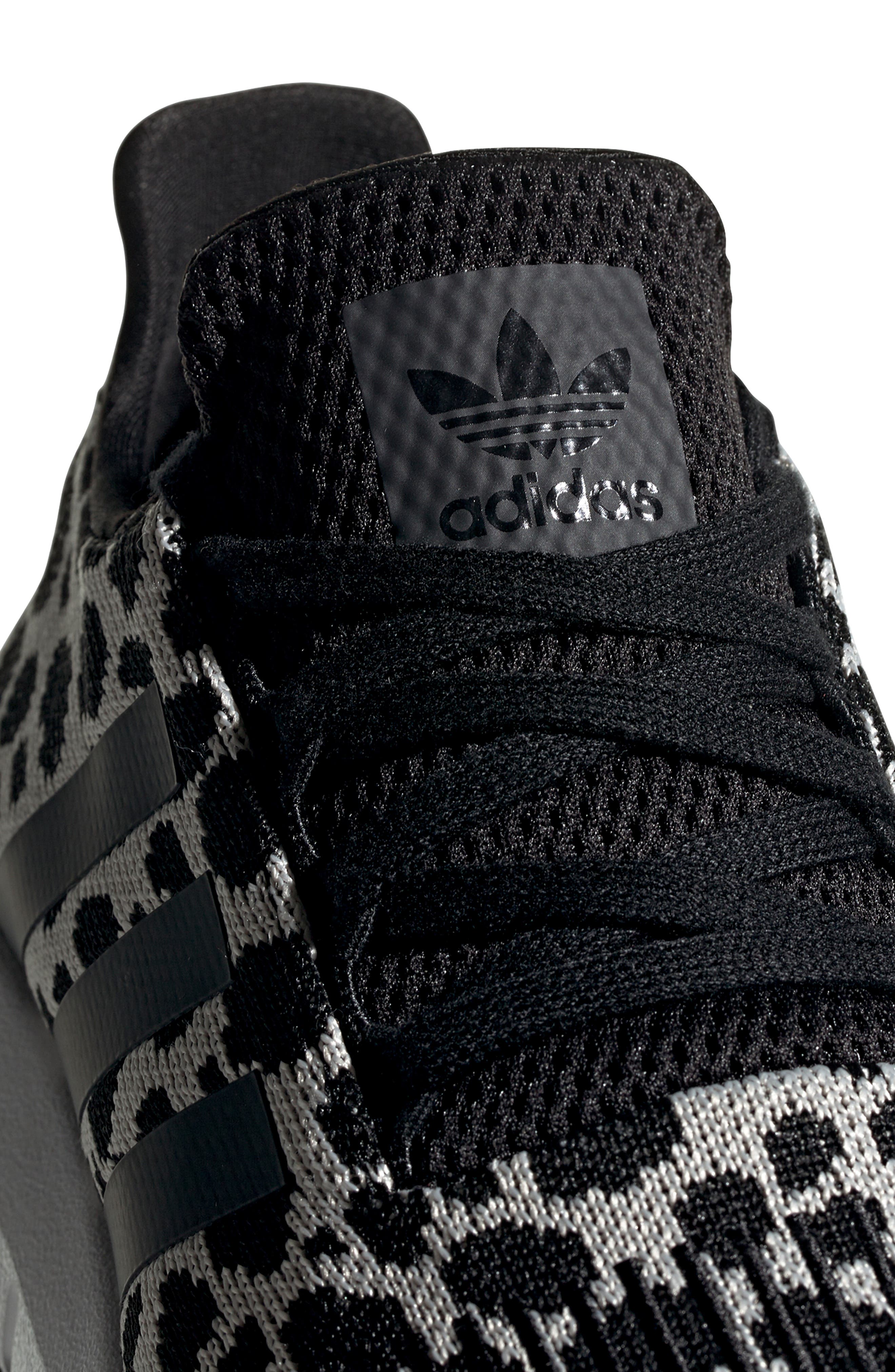 adidas swift run black and white cheetah