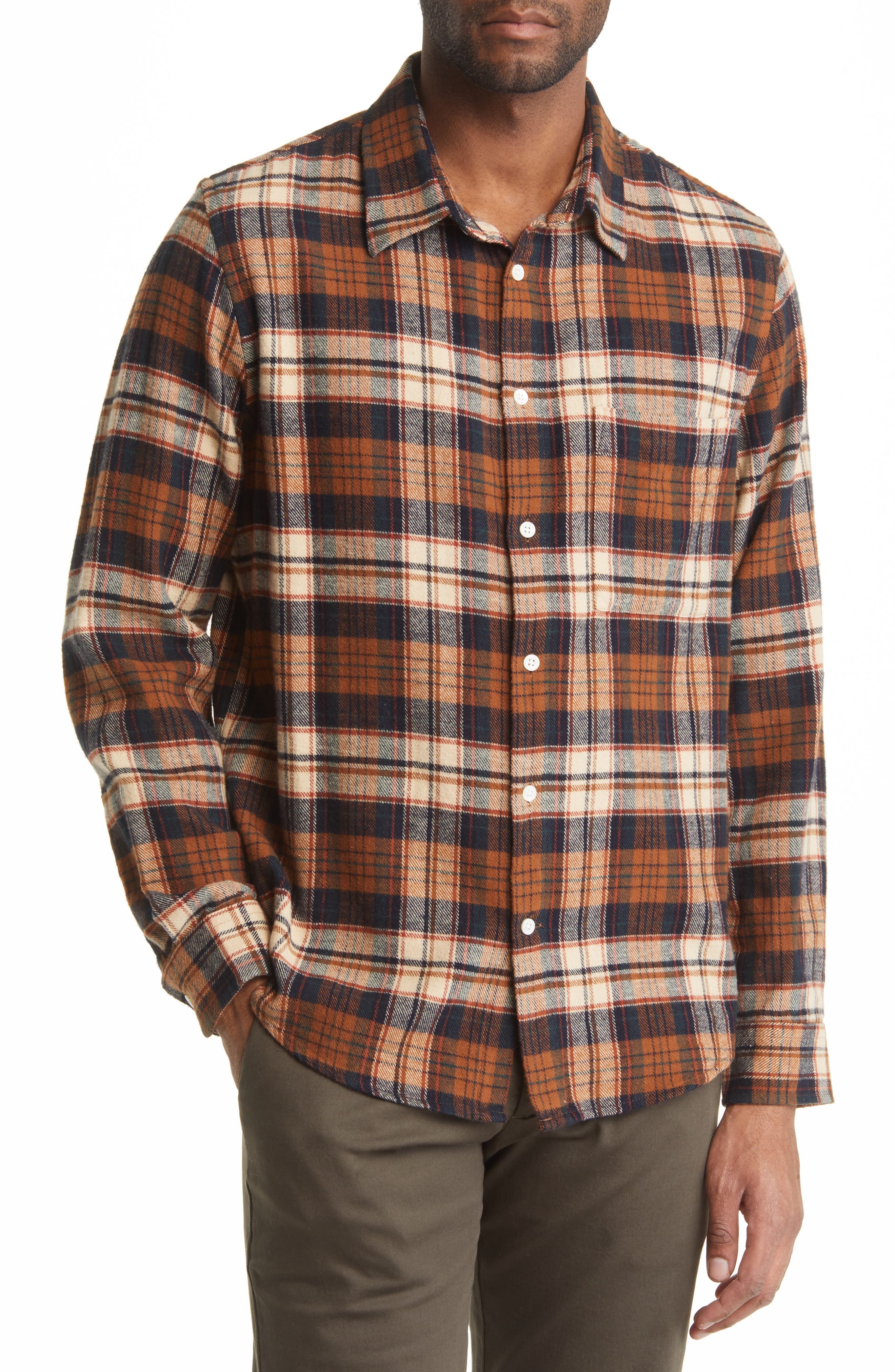 brown and white flannel jacket
