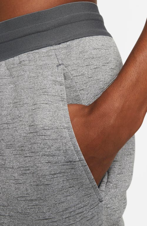Shop Nike Dri-fit Yoga Pants In Black/iron Grey