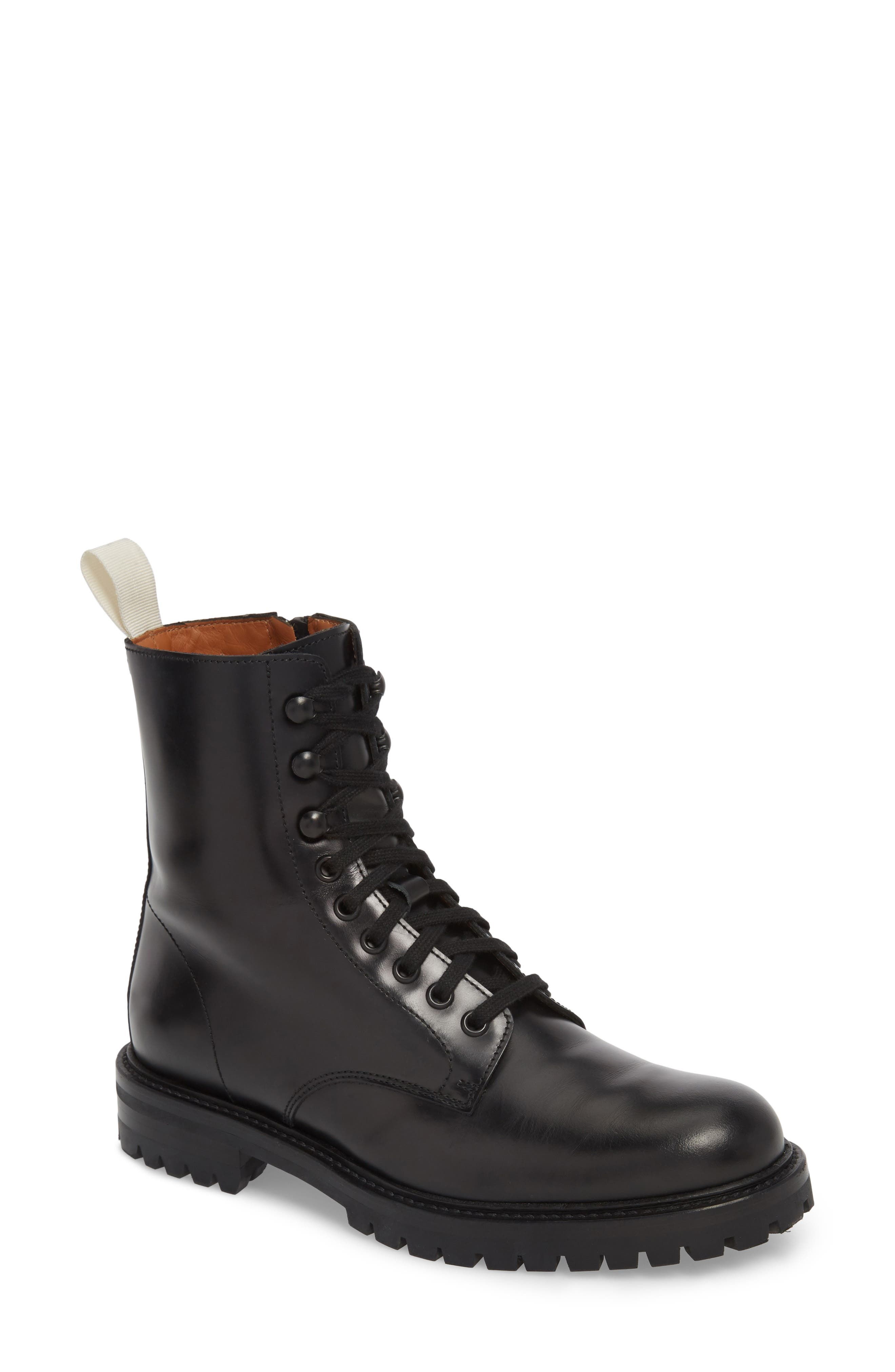 woman by common projects combat boots