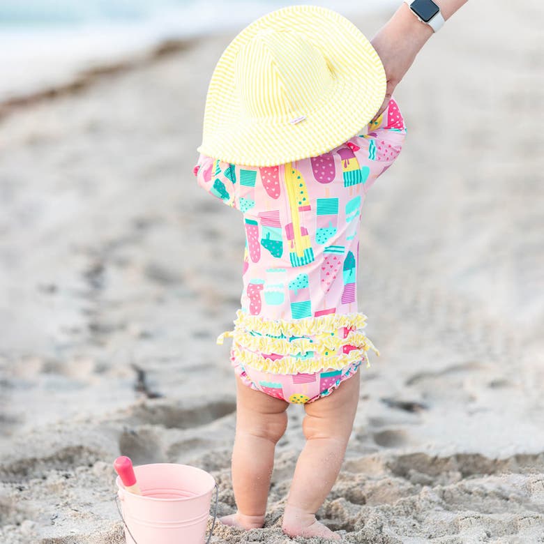 Rufflebutts Toddler Girls Long Sleeve Upf50+ One Piece Rash Guard In Ice Cream Social