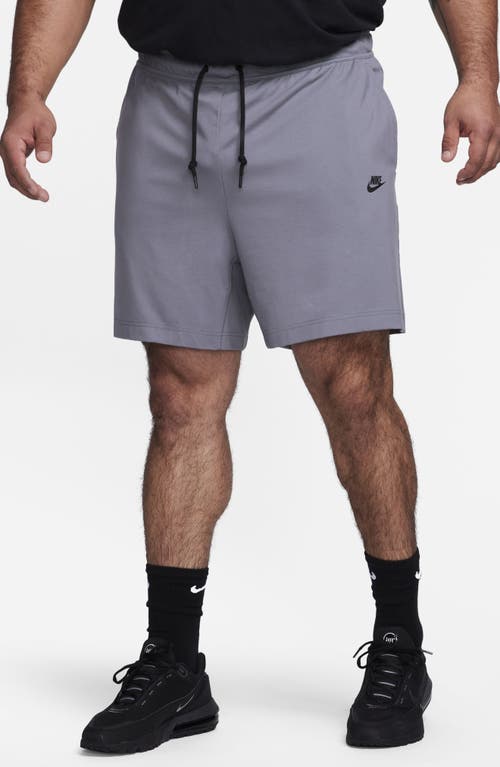 Shop Nike Lightweight Tech Knit Shorts In Light Carbon/black