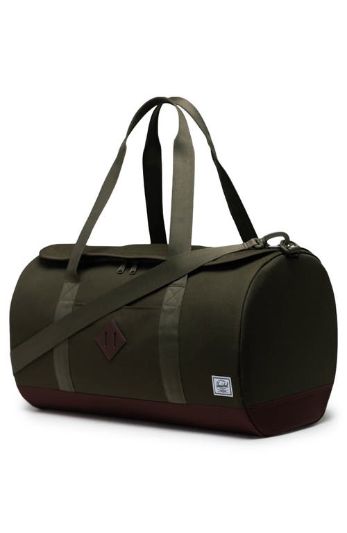 Shop Herschel Supply Co . Heritage Duffle Bag In Ivy Green/chicory Coffee