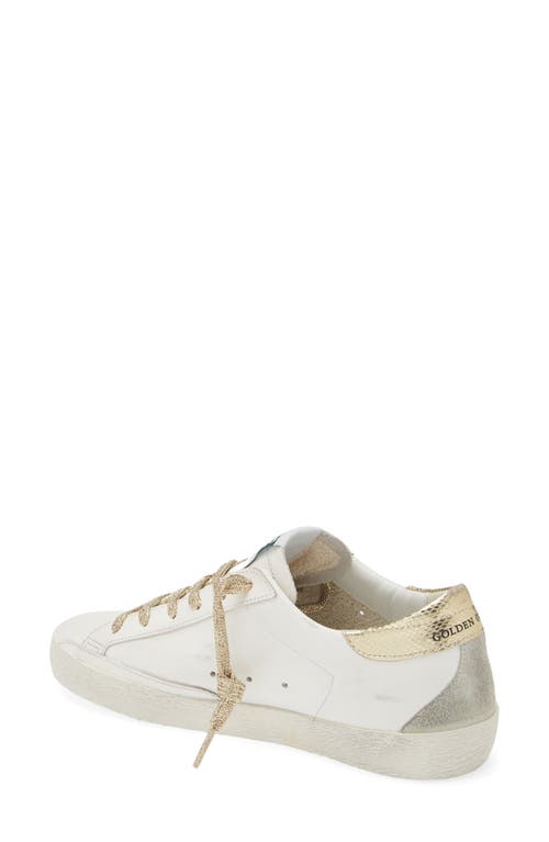 Shop Golden Goose Super-star Low Top Sneaker In White/gold