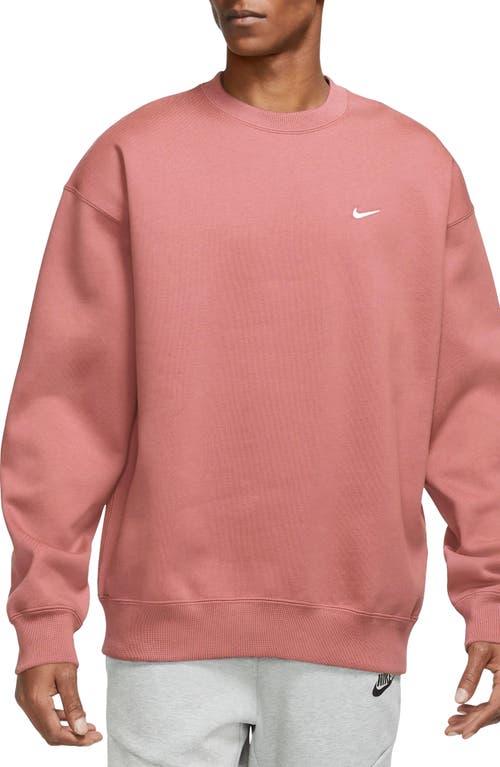 Shop Nike Solo Swoosh Oversize Crewneck Sweatshirt In Red Stardust/white