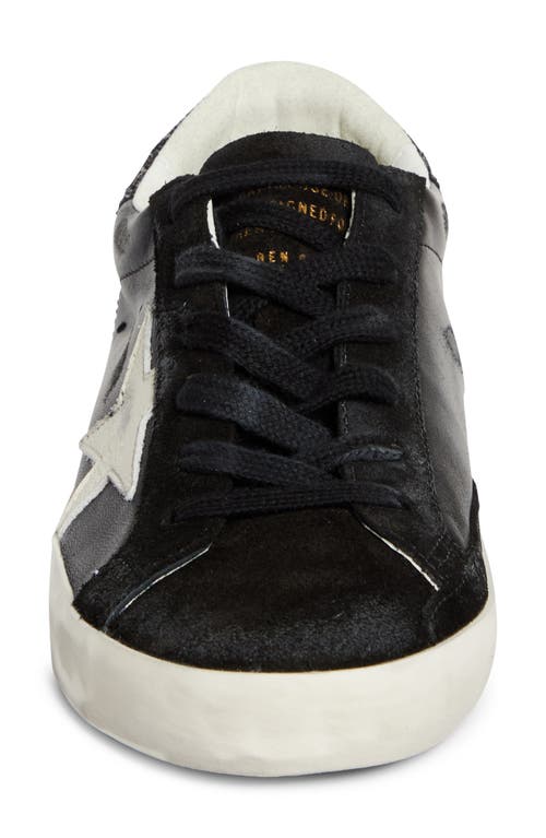 Shop Golden Goose Super-star Low Top Sneaker In Black