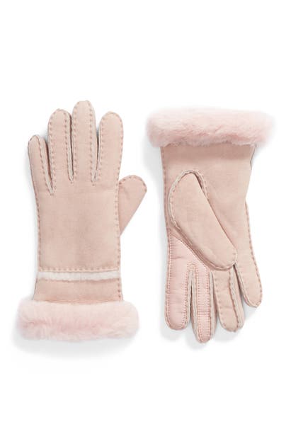 Click to view more detailed imagery on our partner's website Ugg Stitched Slim Tech Gloves In Pink Crystal
