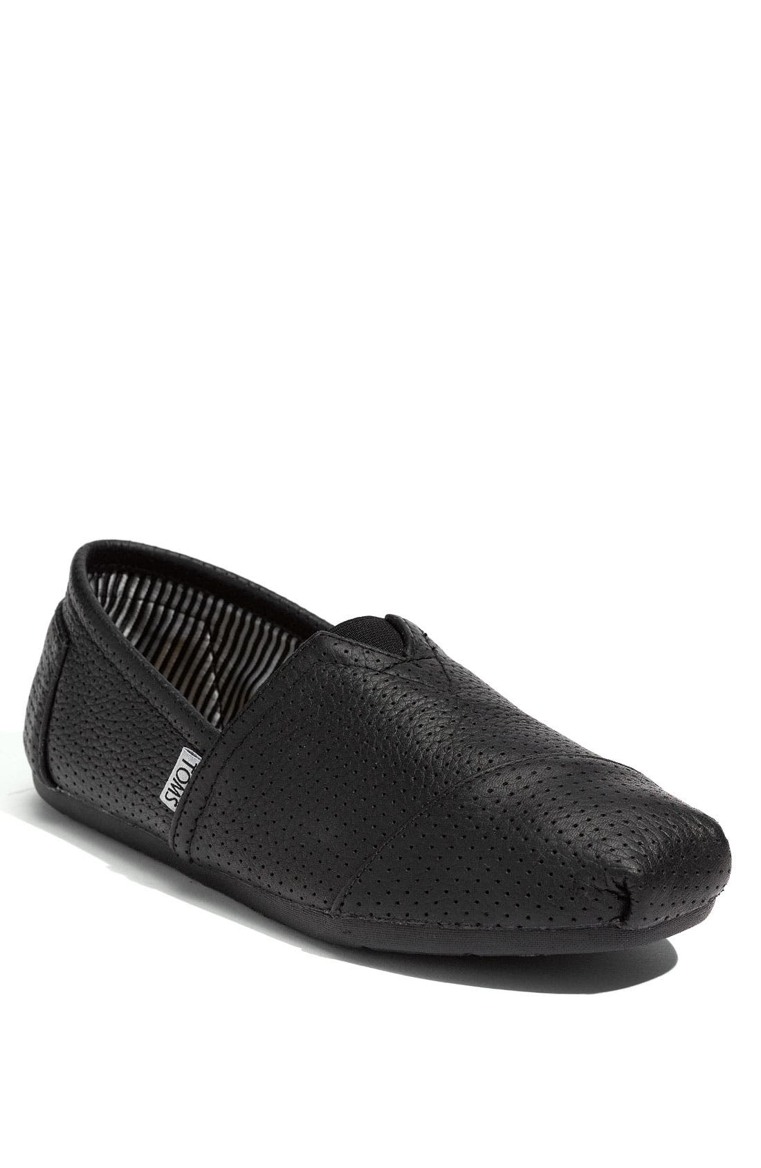 toms black leather slip ons