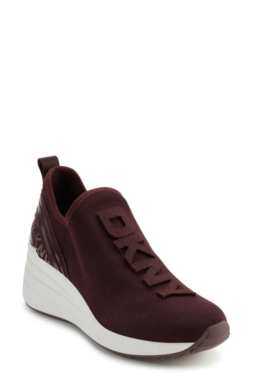 Shop Dkny Keeva Wedge Knit Sneaker In Wine