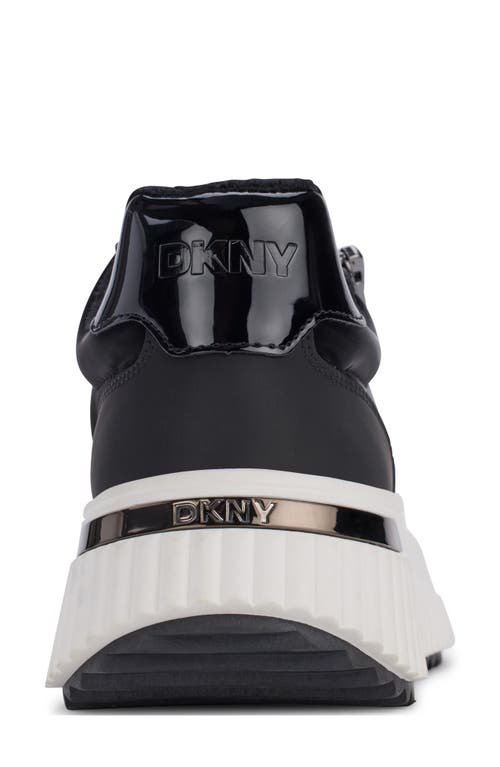 Shop Dkny Laurence Wedge Sneaker In Black