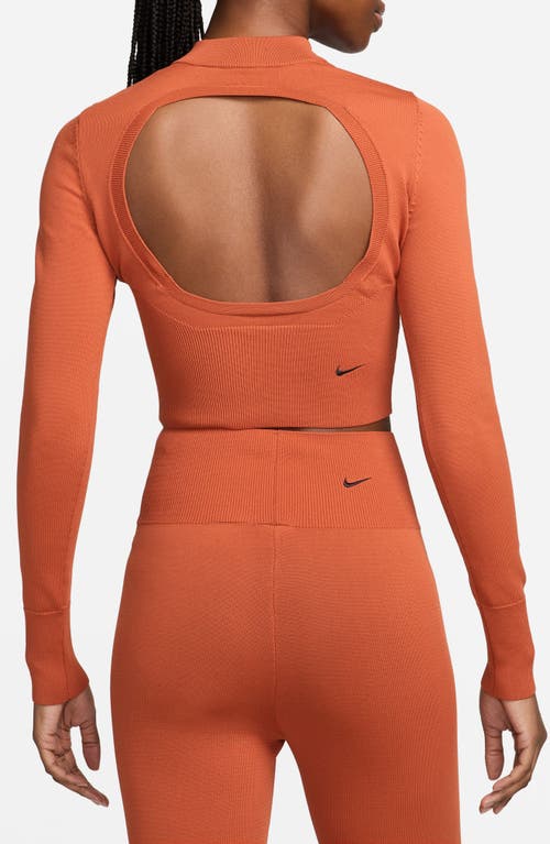 Shop Nike Open Back Crop Sweater In Burnt Sunrise/black