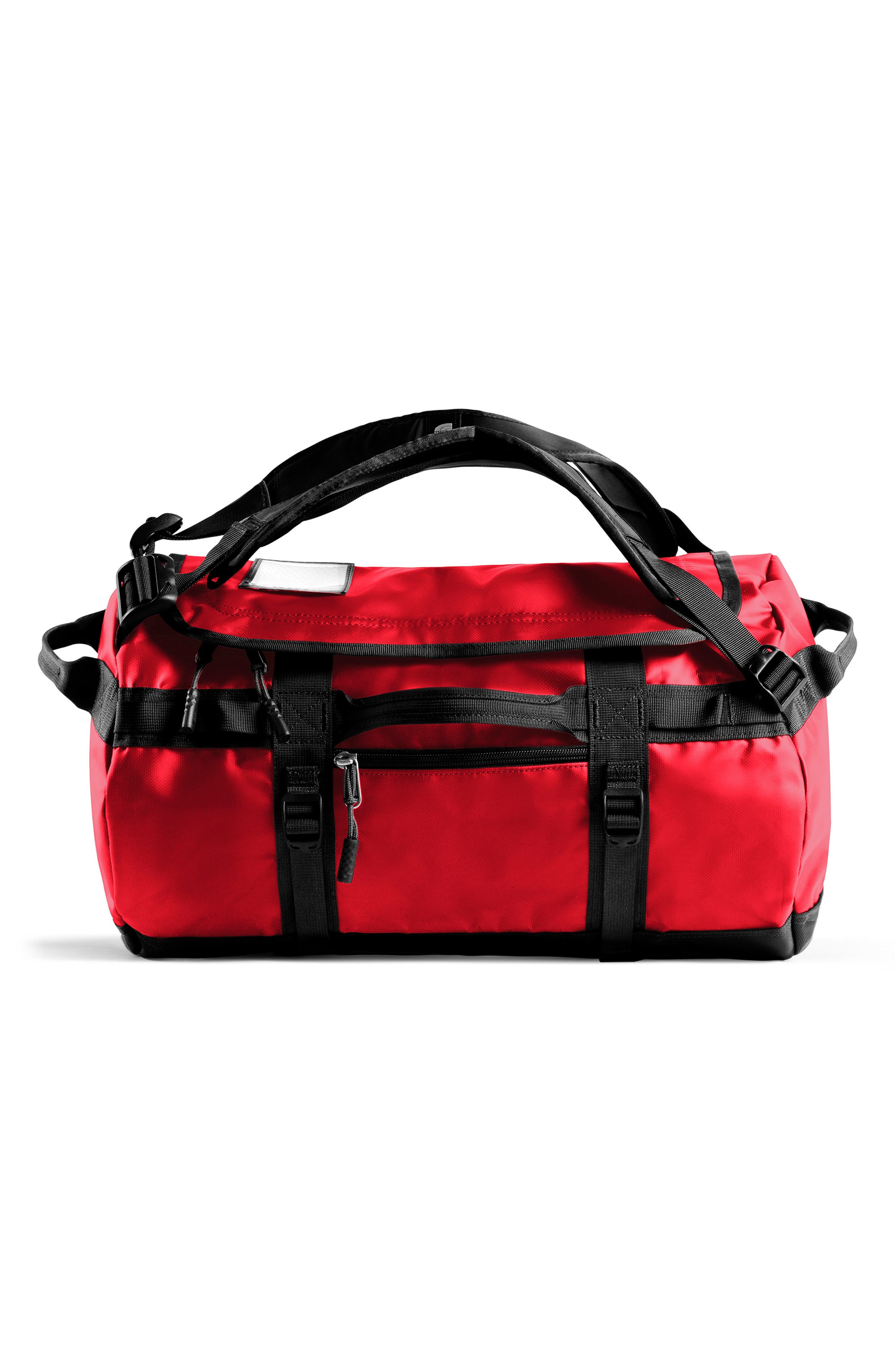 small red duffle bag