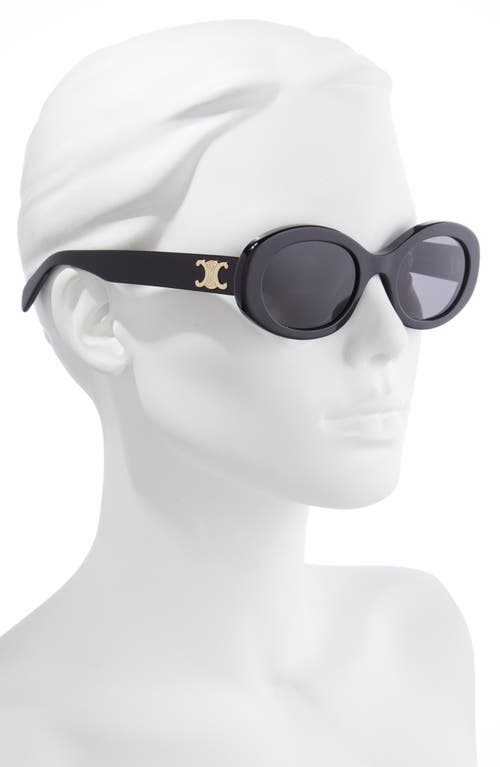 Shop Celine Triomphe 52mm Oval Sunglasses In Shiny Solid Black/smoke