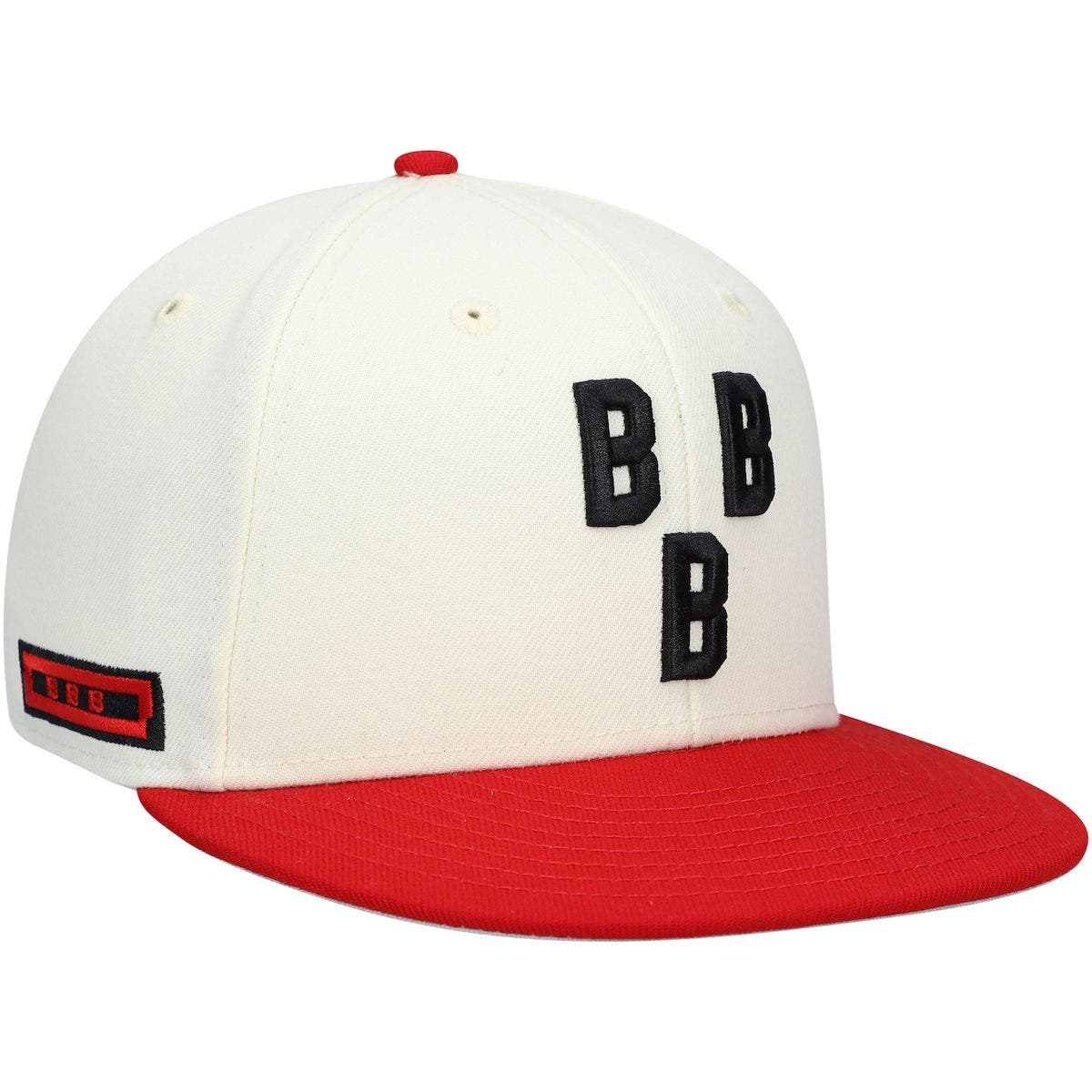 cream and red fitted hat