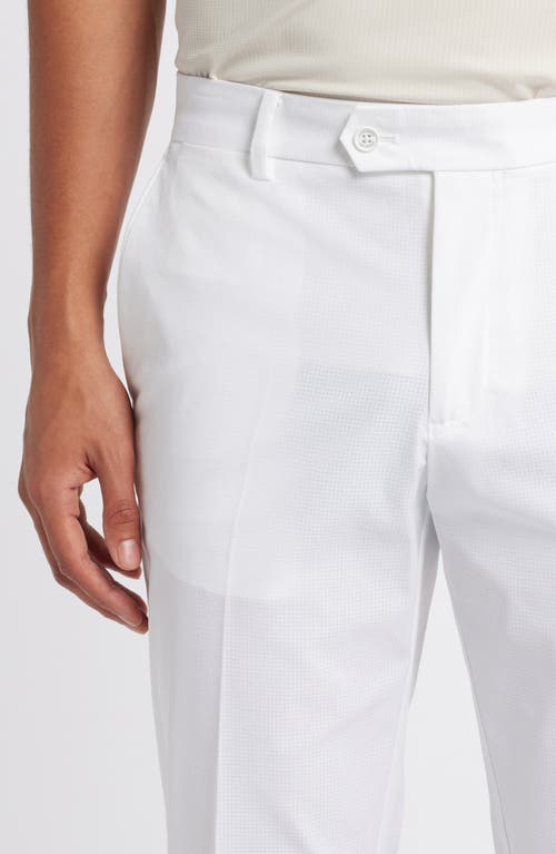 Shop J. Lindeberg Vent Flat Front Performance Golf Pants In White