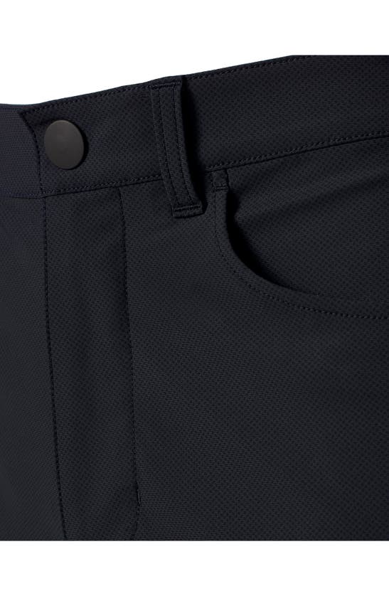 Shop Rhone Momentum Water Repellent Flat Front Golf Pants In True Navy