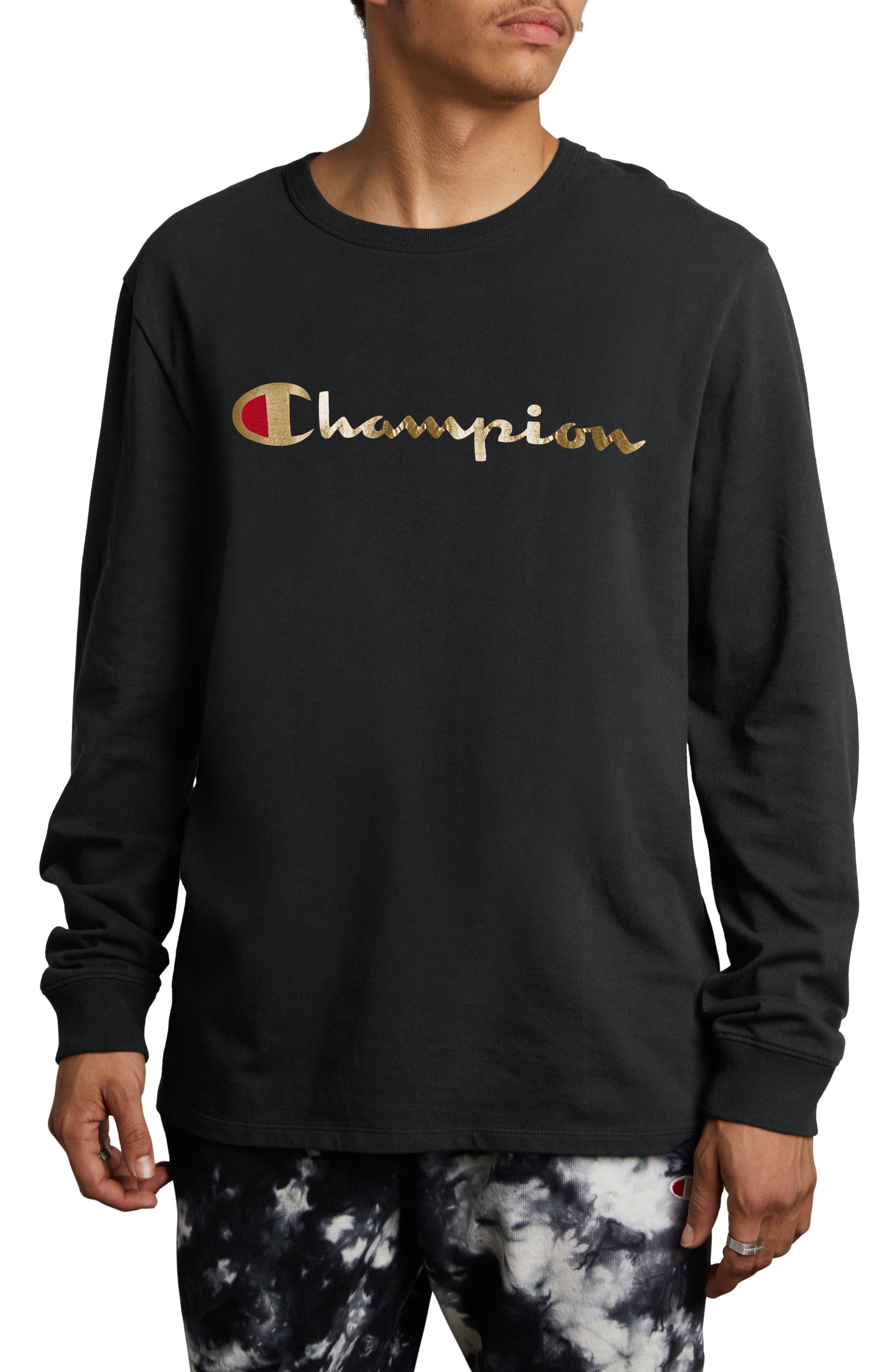 black champion hoodie with gold logo
