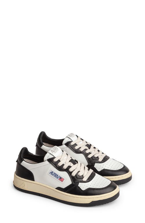 Shop Autry Medalist Low Sneaker In White/black