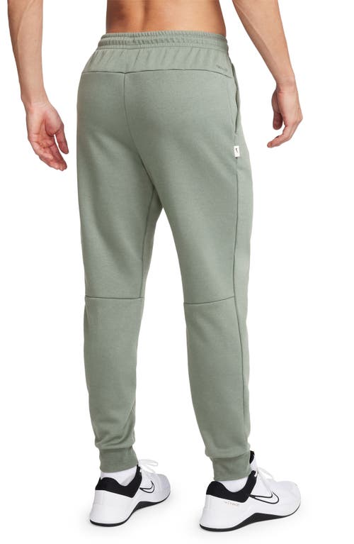 Shop Nike Primary Dri-fit Joggers In Jade Horizon/jade Horizon