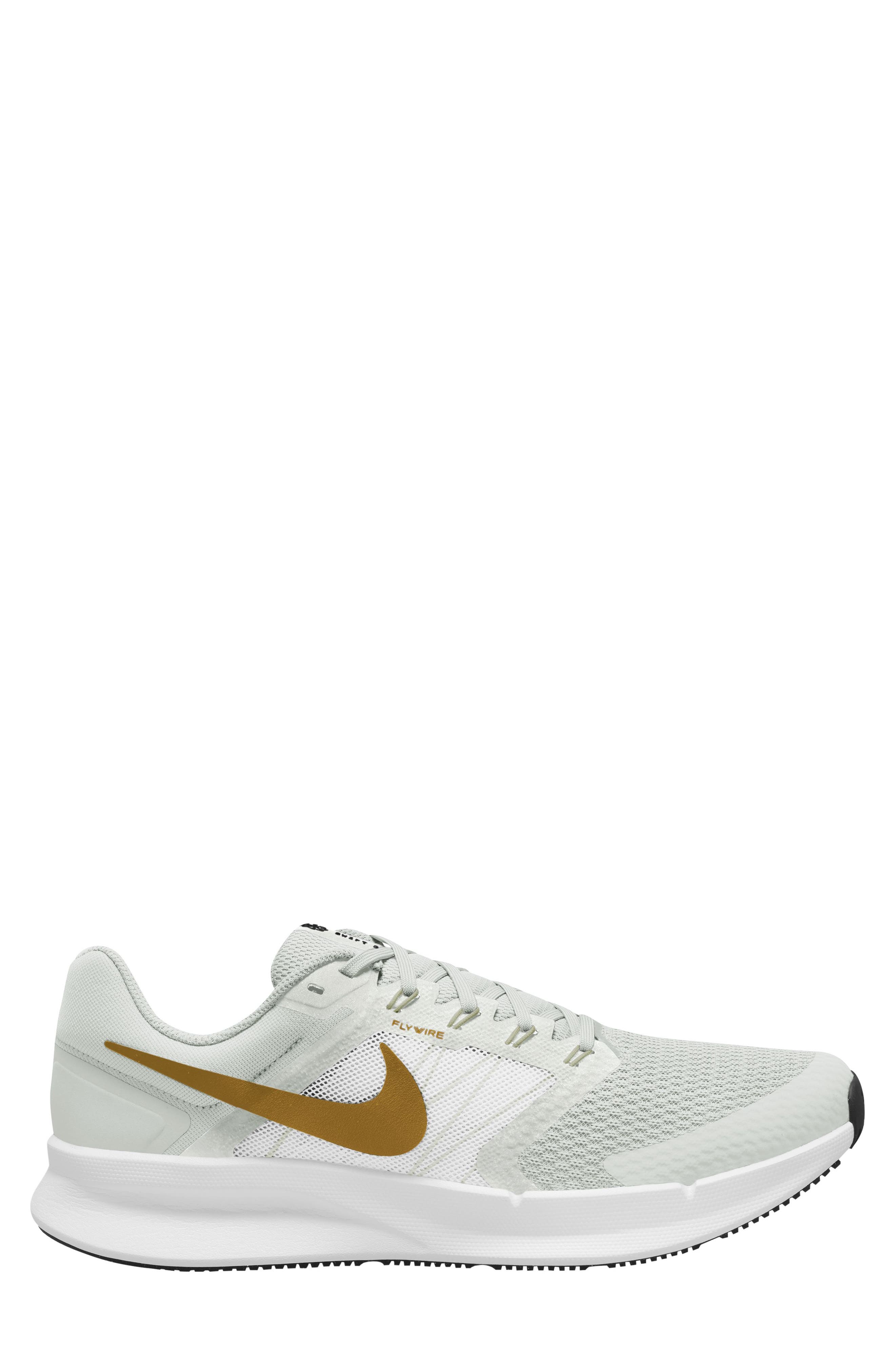 white nike run swift