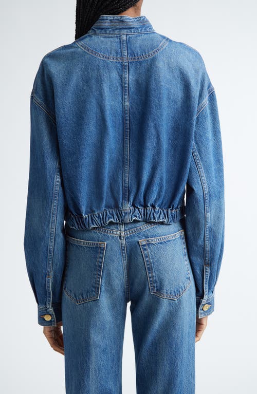 Shop Ulla Johnson The Alessa Denim Bomber Jacket In Danube Medium Indigo Wash