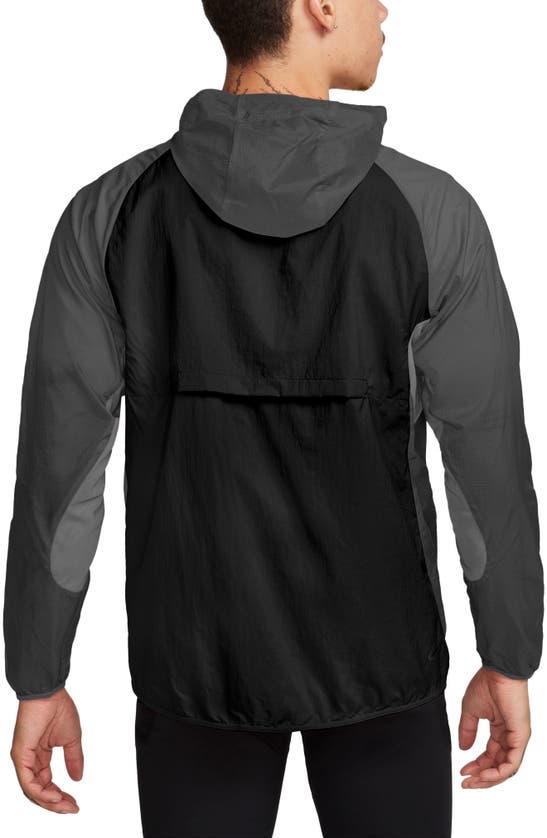 Shop Nike Trail Aireez Water Repellent Hooded Running Jacket In Black/ Anthracite/ White
